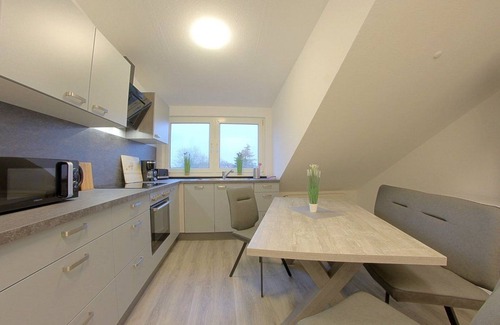 Midlum Apartment | Family-Friendly Retreat at Gästehaus Midlum with Kitchen