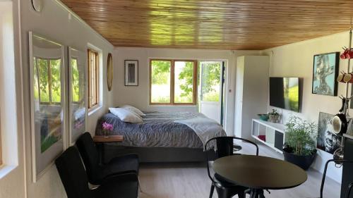 Loderup House | Gästhus in Lush Garden with Private Beach & Ocean Views