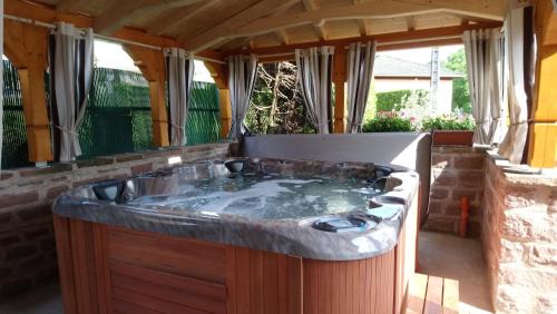 Triembach-au-Val Apartment | Inviting Gîte "Au Vigneron" with Spa & Hot Tub Retreat