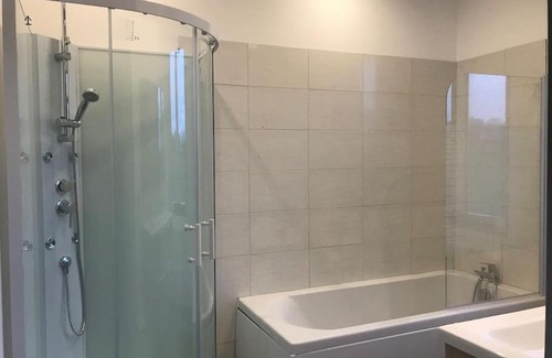 Sainte-Mere-Eglise House | Welcoming Gîte with Oceanfront Views and Spa Amenities