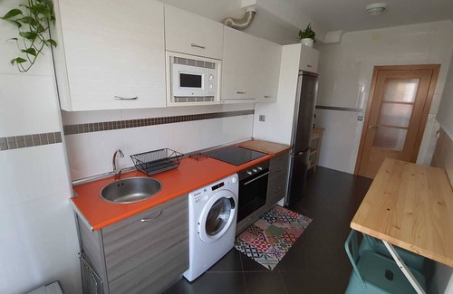 Suances Apartment | Experience Gabriela's Ground Floor Garden Retreat