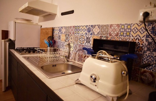 Corso dei Mille - Sant'Erasmo Apartment | Discover Gabriella's Attic: Spa and Family-Friendly Comfort