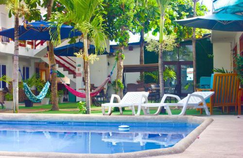Puerto Villamil House | Isabela Hotel Loja: Oceanfront Retreat with Pool Access