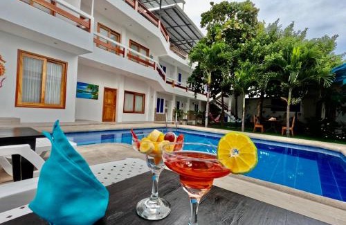 Puerto Villamil House | Isabela Hotel Loja: Oceanfront Retreat with Pool Access