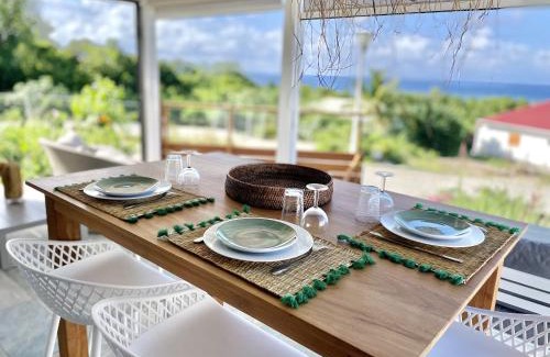 Grand-Bourg Villa | Galanterie: Oceanfront Bliss with Top Amenities & 9.1 Rating