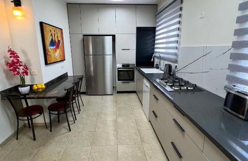 Tiberias Apartment | Galei Kinneret: Oceanfront Escape with Family-Friendly Amenities