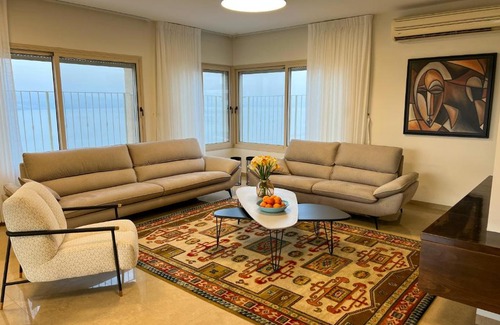 Tiberias Apartment | Galei Kinneret: Oceanfront Escape with Family-Friendly Amenities