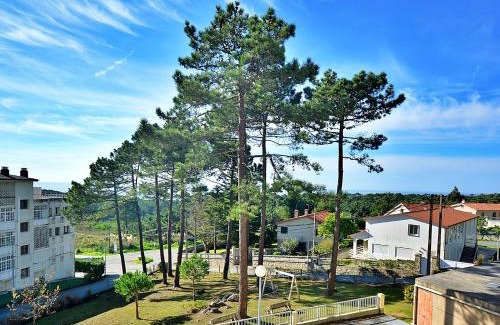 San Vicente do Grove Apartment | Scenic Apartment with Views in Pedras Negras - 9.3/10 Score