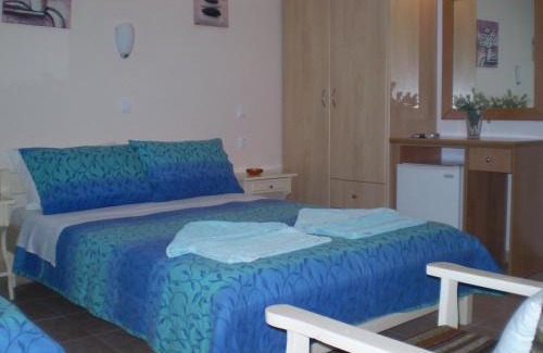 Ios Town Apartment | Oceanfront Galini Pension: Family-Friendly Getaway Awaits