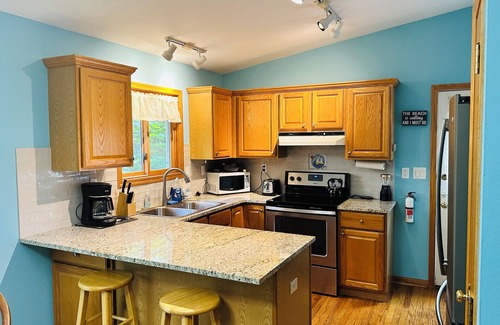 Harbert House | Exciting Getaway: Game Room & Fire Pit Near Warren Dunes