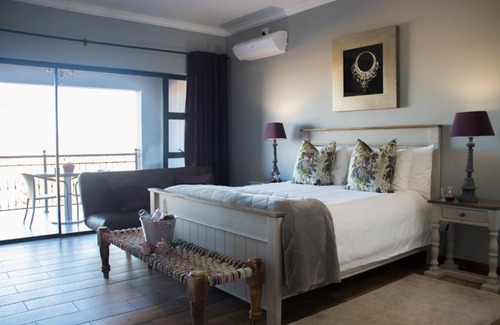Vryburg House | Experience Game View Lodge: Pet Friendly with Oceanfront Pool