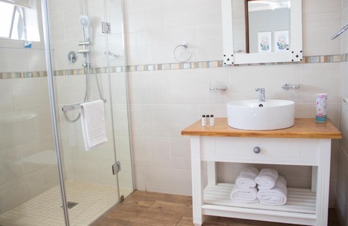 Vryburg House | Experience Game View Lodge: Pet Friendly with Oceanfront Pool