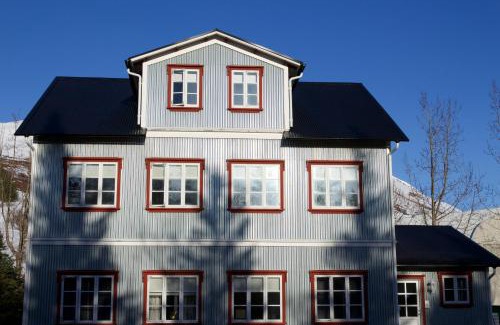 Husavik Apartment | Discover Gamli Skólinn Húsavík: 4-Star Family Retreat