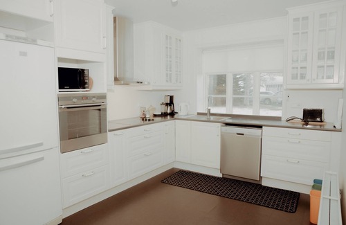 Husavik Apartment | Discover Gamli Skolinn Husavik: Family-Friendly Retreat