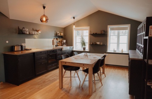 Husavik Apartment | Discover Gamli Skolinn Husavik: Family-Friendly Retreat