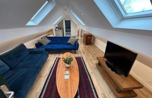 Newtownards Apartment | Cozy Garage Loft Conversion in Killinchy with Fireplace