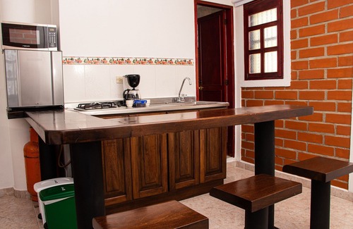 Retiro Apartment | Discover Garcha: Family-Friendly Hotel with Spa and Dining