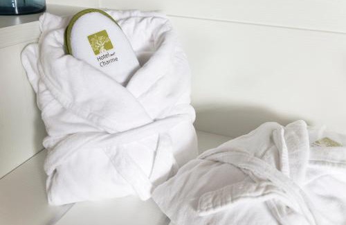Nago-Torbole Hotel | Discover Garda Hotel Forte Charme: 4-Star Oceanfront Retreat