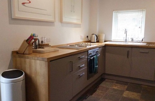 West Laroch Cottage | Cozy Garden Cottage with Ocean Views and Pet-Friendly Perks
