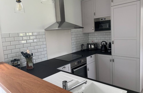 Saltmills Cottage | Discover Garden Cottage on Tintern Trails with Ocean Views