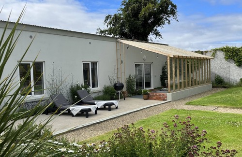 Saltmills Cottage | Discover Garden Cottage on Tintern Trails with Ocean Views
