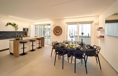 Tesimo Apartment | Relax at Garden e Wellness LE VIGNE - Oceanfront Oasis
