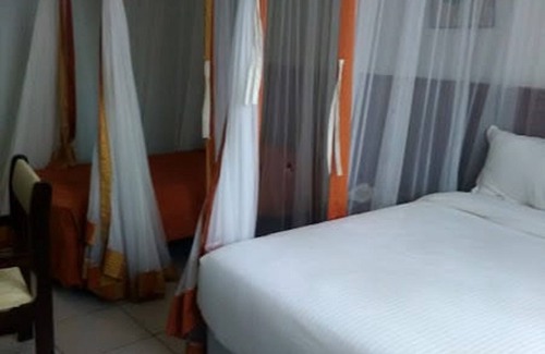 Ngelani Hotel | Comfortable Stay at Garden Hotel with Breakfast & Dining