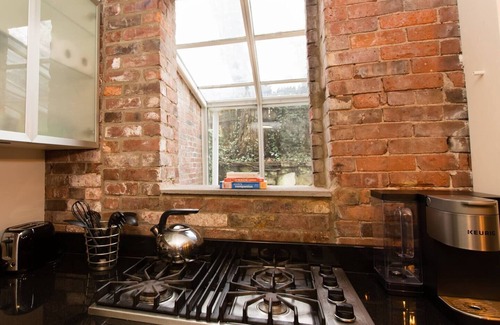 Mill River Apartment | Impressive Garden Level Suite on Court Street - Family-Friendly