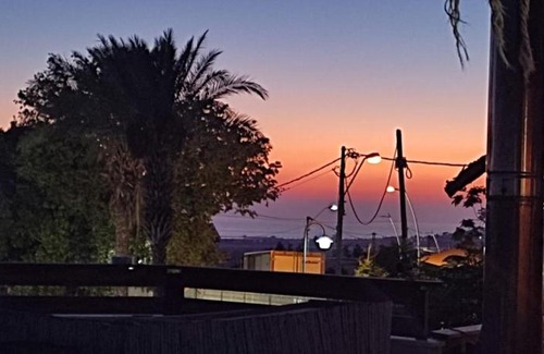 Shlomi Ski Chalet | Experience Garden on TOP of the WORLD: 4-Star Ocean View Retreat