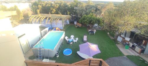 Shlomi Ski Chalet | Experience Garden on TOP of the WORLD: 4-Star Ocean View Retreat