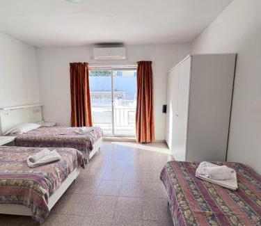 Tal-Ghoqod Apartment | Garden View Apartment No 40: Family-Friendly Oasis