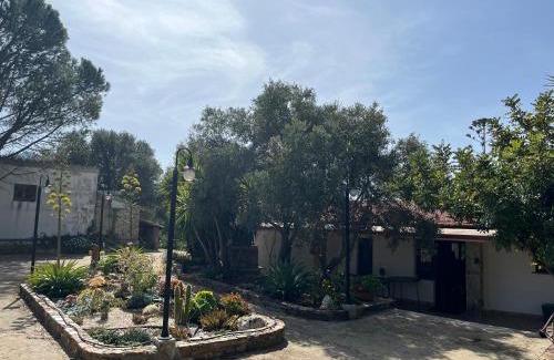 Fluminimaggiore House | Pet-Friendly GardenRocks: Guest Rated 10/10 for Families