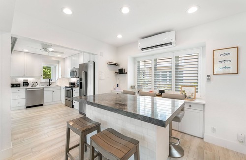 Rum Point House | Beachfront Villa with Communal Pool and Free Kayak Access