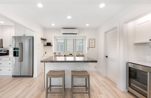 Rum Point House | Beachfront Villa with Communal Pool and Free Kayak Access