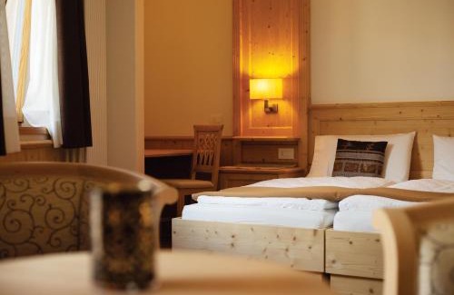 Sfruz Hotel | Family-Friendly Stay at Garni Le Maddalene - 4 Star Rated