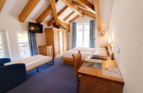 Dimaro Hotel | Discover Garni Sottobosco: Cozy Stay with Family-Friendly Perks