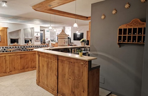 Dimaro Hotel | Discover Garni Sottobosco: Cozy Stay with Family-Friendly Perks