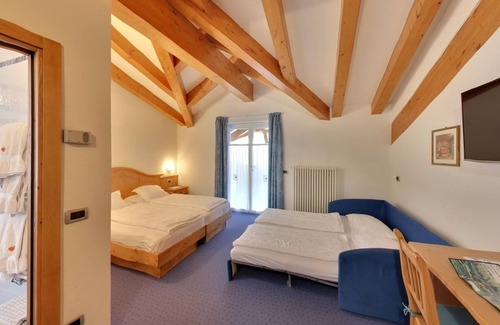 Dimaro Hotel | Discover Garni Sottobosco: Cozy Stay with Family-Friendly Perks