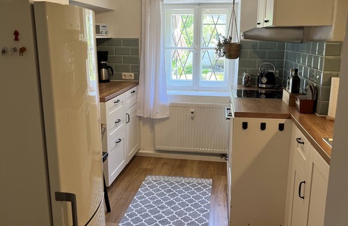 Traunstein Apartment | Gartenglück - Relax and Enjoy Ocean Views in Historic Charm