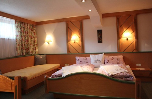 Fieberbrunn Hotel | Discover Gasthof Eiserne Hand: Spa & Family-Friendly Stays