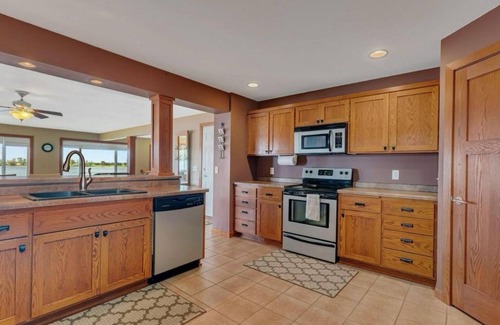 Browerville House | Gather at this spacious 5-bedroom lake home with 277' sandy beach, private dock