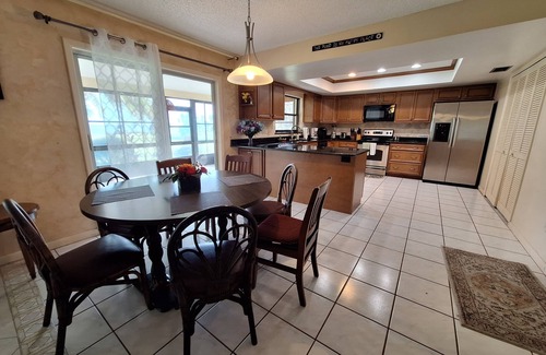 Oviedo House | Lakefront 3-Bed Ranch with Hot Tub & Exceptional Reviews