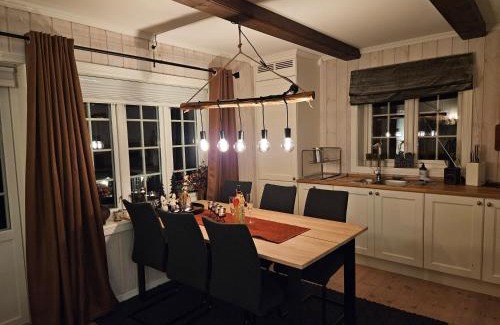 Atra Apartment | Inviting Gaustatoppen View Apartment: Family & Pet Friendly