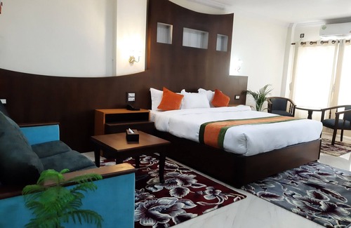 Siddharthanagar Hotel | Relax at Gautam Buddha Airport Hotel with Pool & Spa