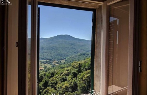 Castelnuovo di Val di Cecina House | Charming House in Historic Center with Garden & Scenic Views