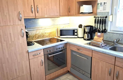 Norddeich House | Comfortable Bungalow with Ocean View & Pet-Friendly Amenities
