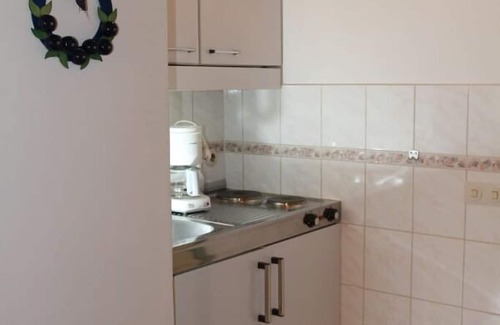 Lam Apartment | Cozy 2-Bedroom Apartment with Balcony and Spa Amenities