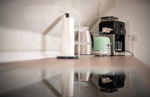 Niederzwehren Apartment | Cozy Retreat with Balcony, Netflix & Family-Friendly Perks