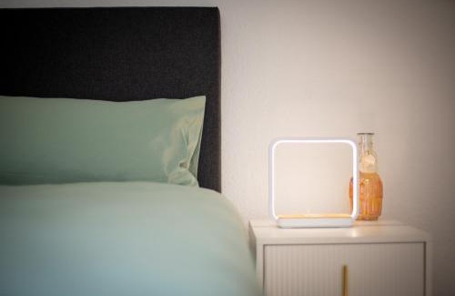Niederzwehren Apartment | Cozy Retreat with Balcony, Netflix & Family-Friendly Perks
