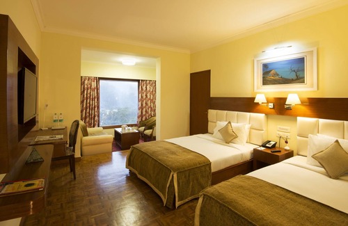 Pudumund Hotel | Relax at Gem Park Ooty: Family-Friendly with Spa & Pool
